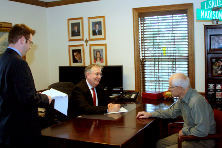 Photo of Robert Ross and Lehn Shepherd in meeting. 